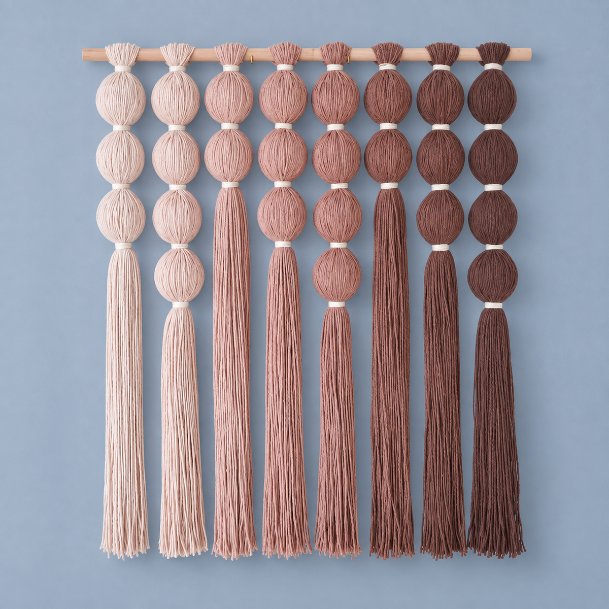 Studio, full grid on blue, wrapped sphere grid in blush, wrapped yarn spheres, white binding cord