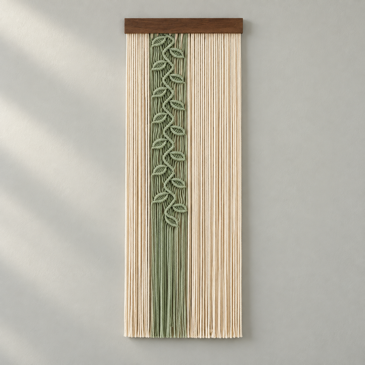 Studio on pale gray, sage leaf vine panel, twisted cord, dark stained wood batten
