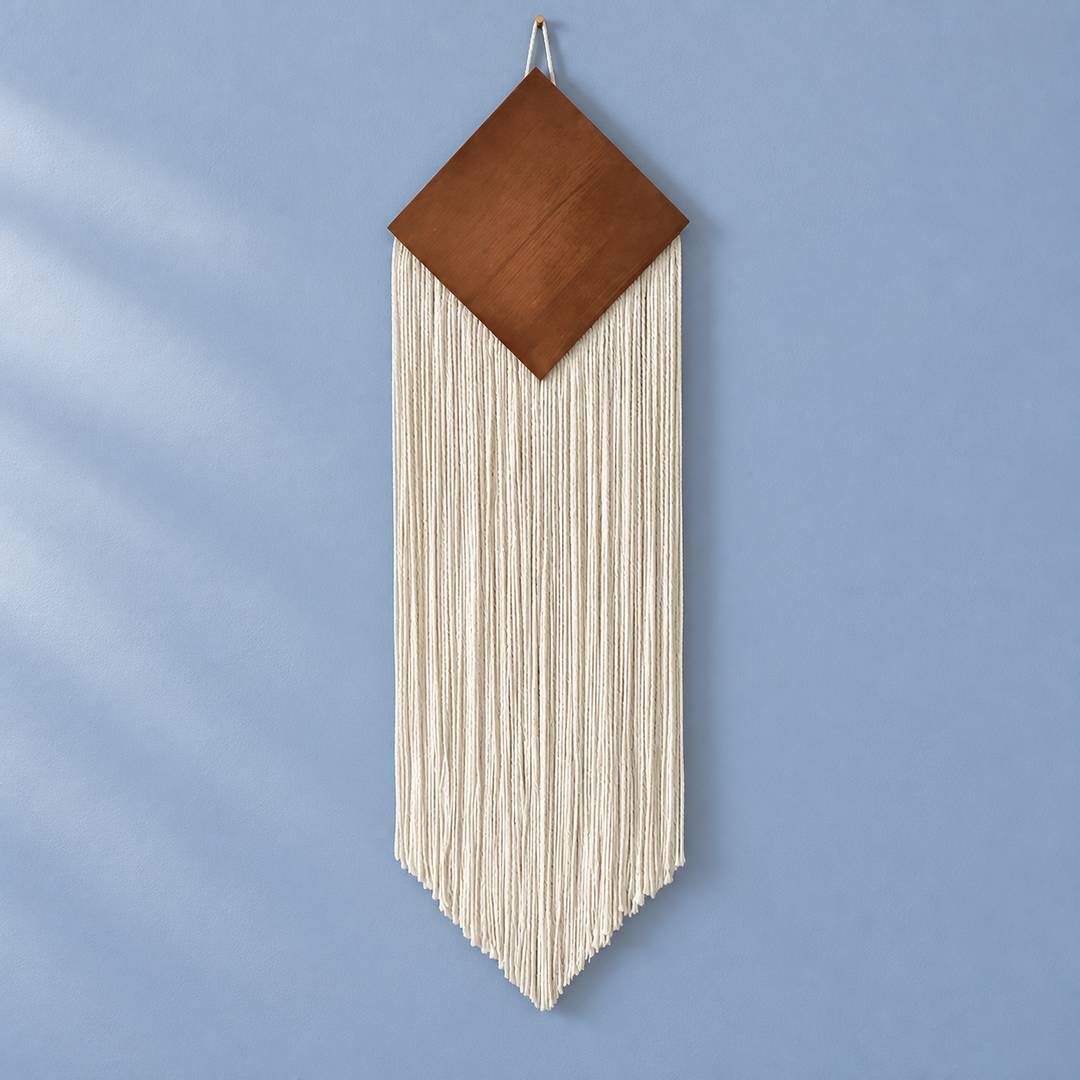 WHITE studio on blue, wood diamond over a narrow chevron fringe