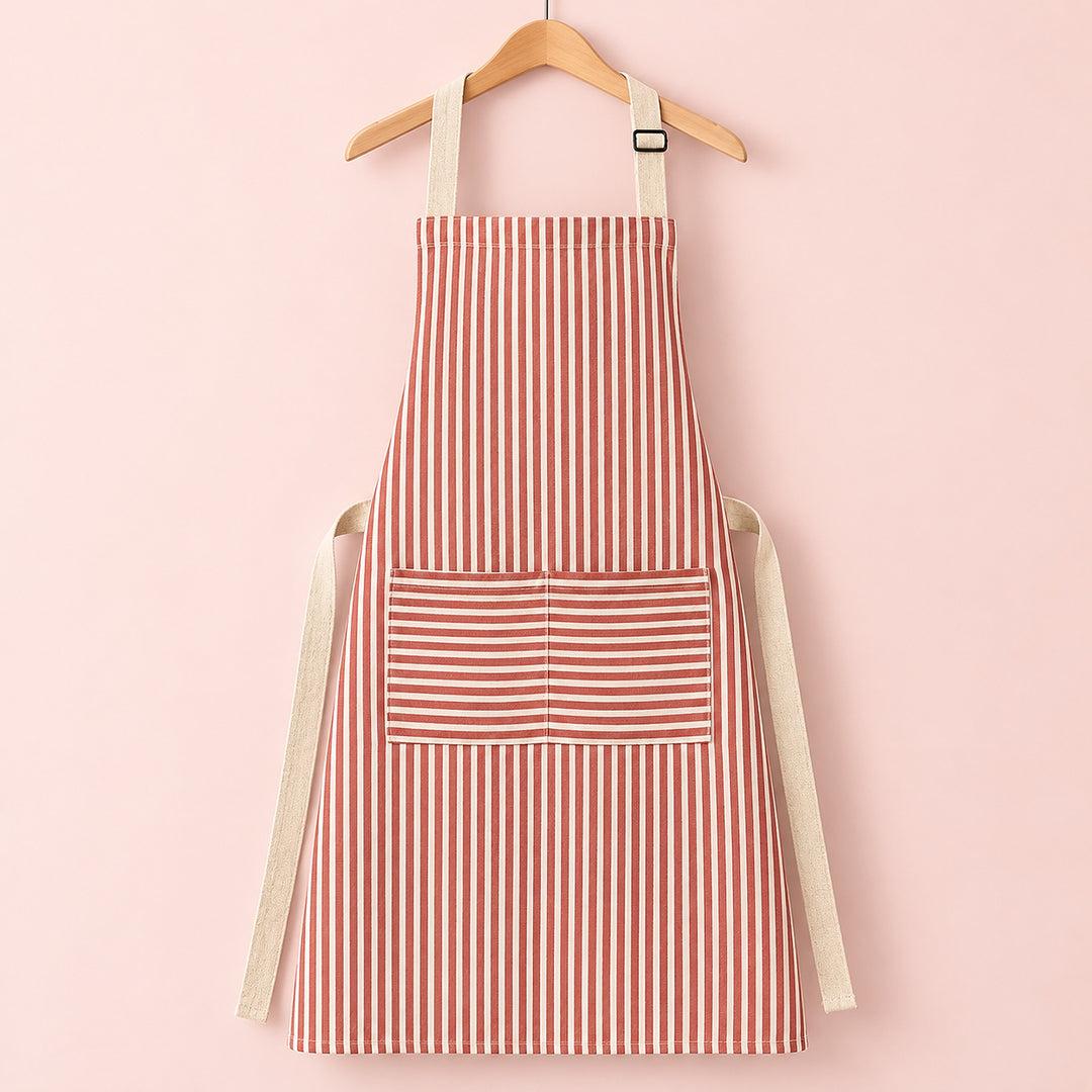 One red striped bib apron with beige straps and divided front pocket.