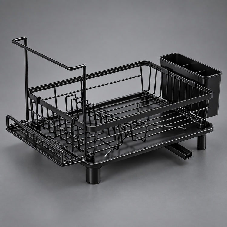 A black metal dish rack with a draining tray, a vertical drying handle, and a side cup holder, photographed on a neutral gray studio background.