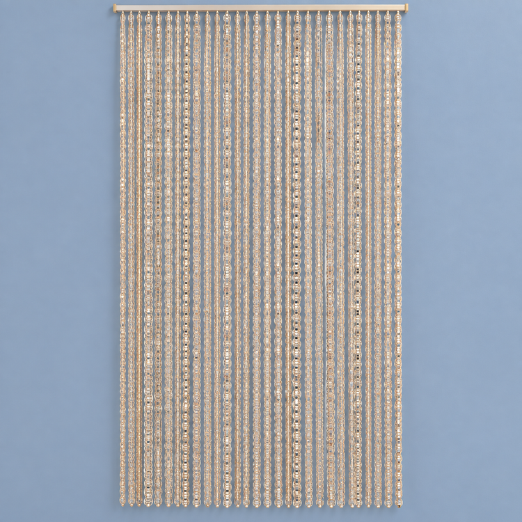 A vertical beaded curtain wall hanging with multiple strands of clear rhinestones and crystals on a gold-toned cord, suspended from a wooden rod against a solid light blue-gray background.