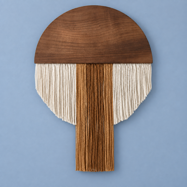Coffee coloredtassel studio on blue, wood half disc in four fringe silhouettes