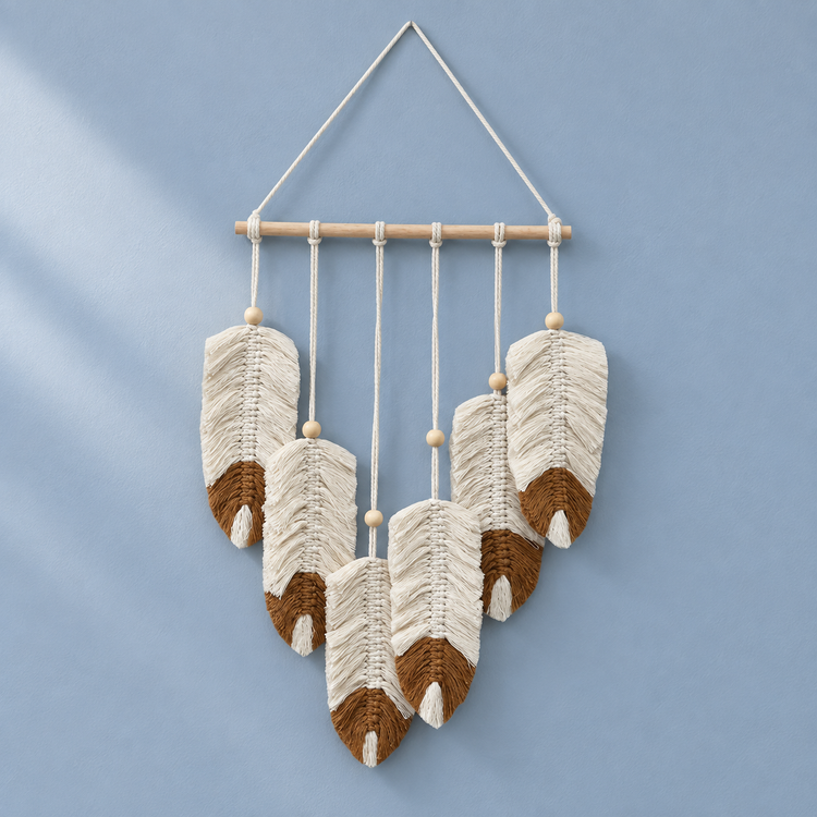 Cream macrame feather cluster with chocolate brown dipped tips on blue