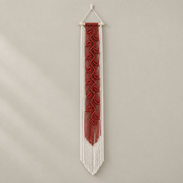 Wine red macrame banner with a cream leaf vine and pointed fringe hem