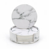 Six white 10 cm artificial-leather coasters with matching holder.