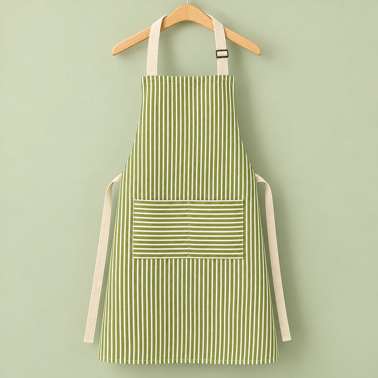 One green striped bib apron with beige straps and divided front pocket.