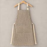 One brown striped bib apron with beige straps and divided front pocket.