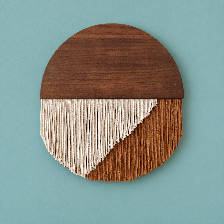 Brown 40x40 studio on teal, closed circle with a diagonal split