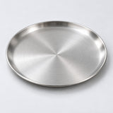 One silver round stainless steel serving plate, 14 cm diameter.