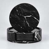 Six black 10 cm artificial-leather coasters with matching holder.