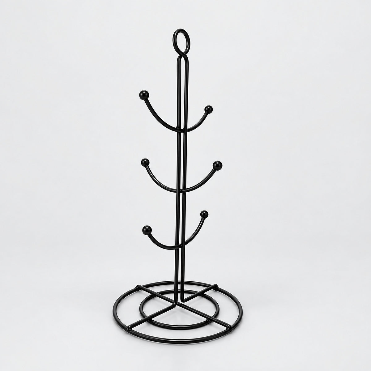 One empty black six-hook mug tree with circular base.