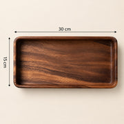 A rectangular dark brown wooden tray with rounded corners, shown from above on a light beige background with dimension lines indicating 30 cm by 15 cm.