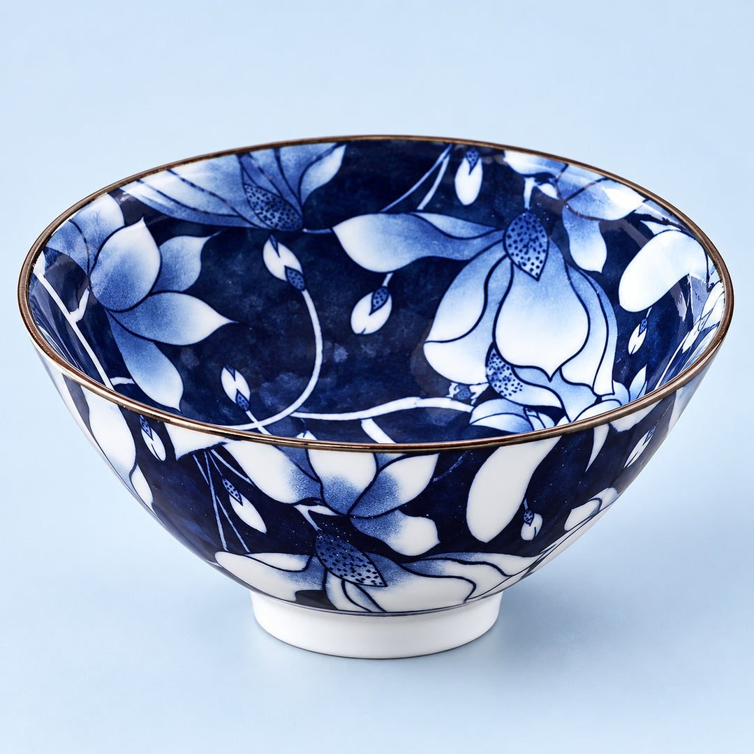 One Blue Magnolia porcelain tea cup with pale flowers on indigo, 70 ml.