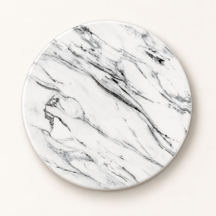 A round coaster with a white marble pattern featuring elegant gray and black veining, shown on a light beige background.