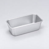 Empty silver aluminum loaf pan, 14.7 x 8.9 x 6.4 cm.
