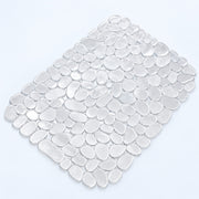 A rectangular sheet of smooth, pebble-shaped glass tiles in a light gray color, arranged in a staggered pattern on a clean white background.