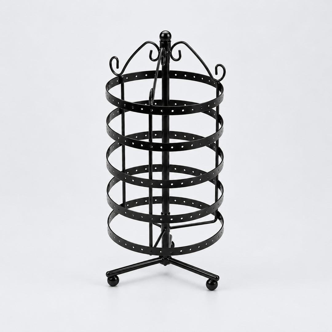 Empty black five-tier jewelry stand with three-foot black tripod with ball-ended feet, as source.