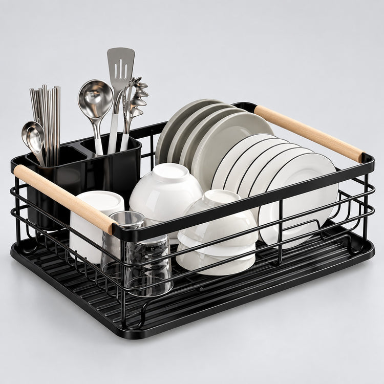 Black wire dish rack with light wood handles, shown holding white bowls, gray plates, and stainless steel utensils on a light gray background.