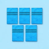 Blue variant: five blue rectangular exfoliating mitts on a lighter blue studio background.