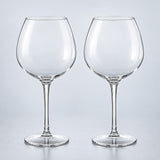 Burgundy set of 2: 2 empty clear stemmed Tritan wine cups on a pale gray studio background.