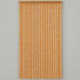 A vertical curtain panel made of hanging narrow strands of metallic gold sequins, suspended from a matching gold rod against a solid light gray background.