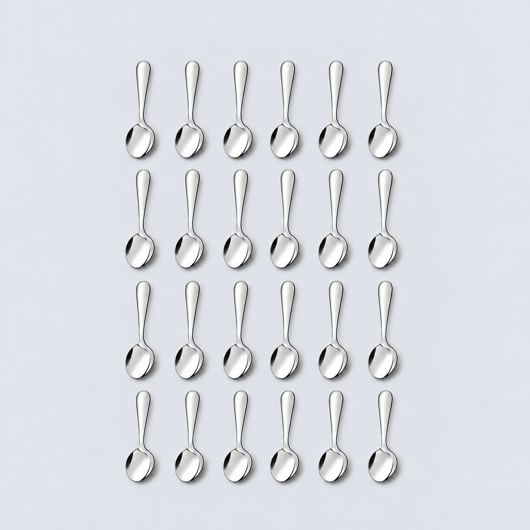 Twenty-four silver teaspoons arranged in four rows of six on a pale gray background.