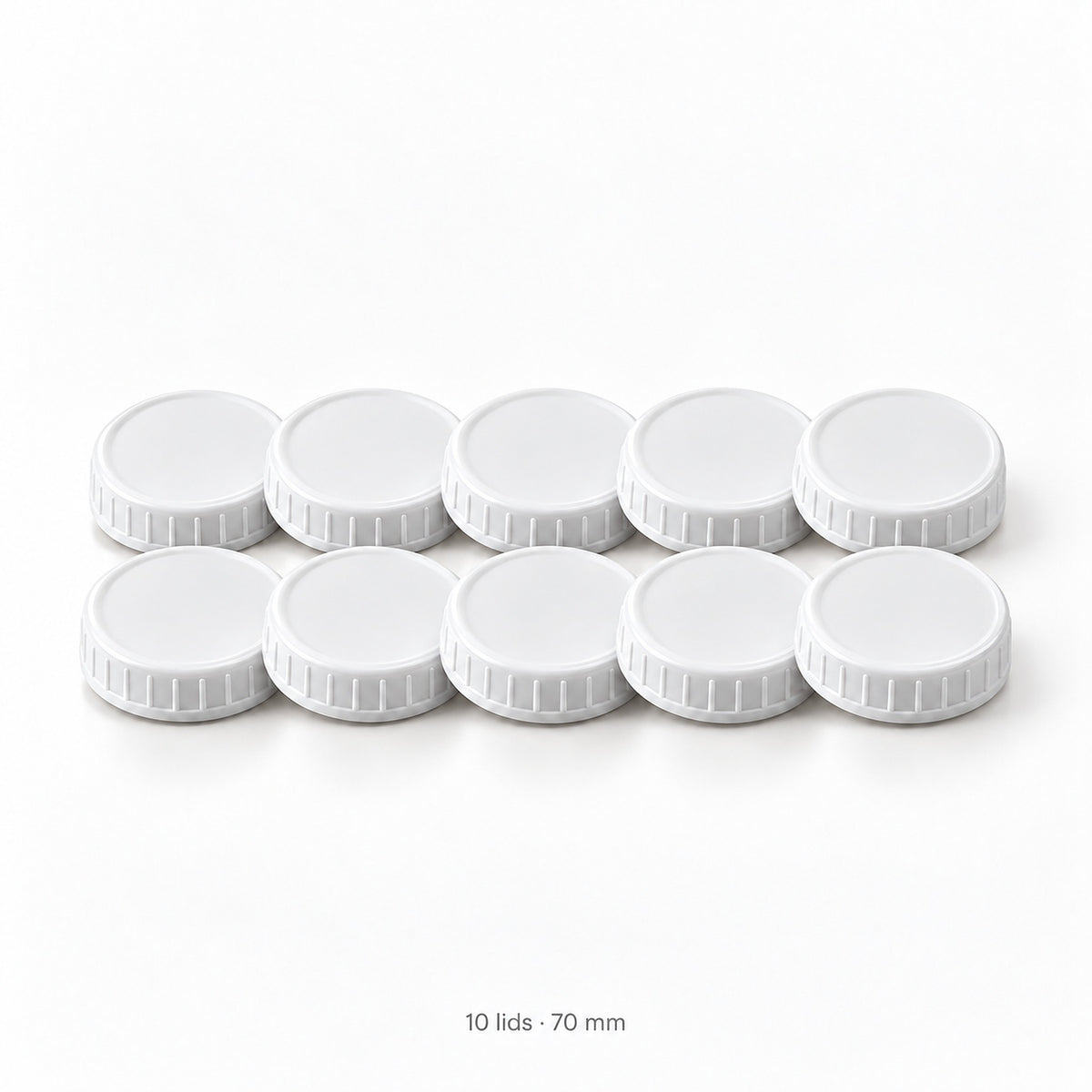 Set of ten white 70 mm ribbed plastic mason jar lids.
