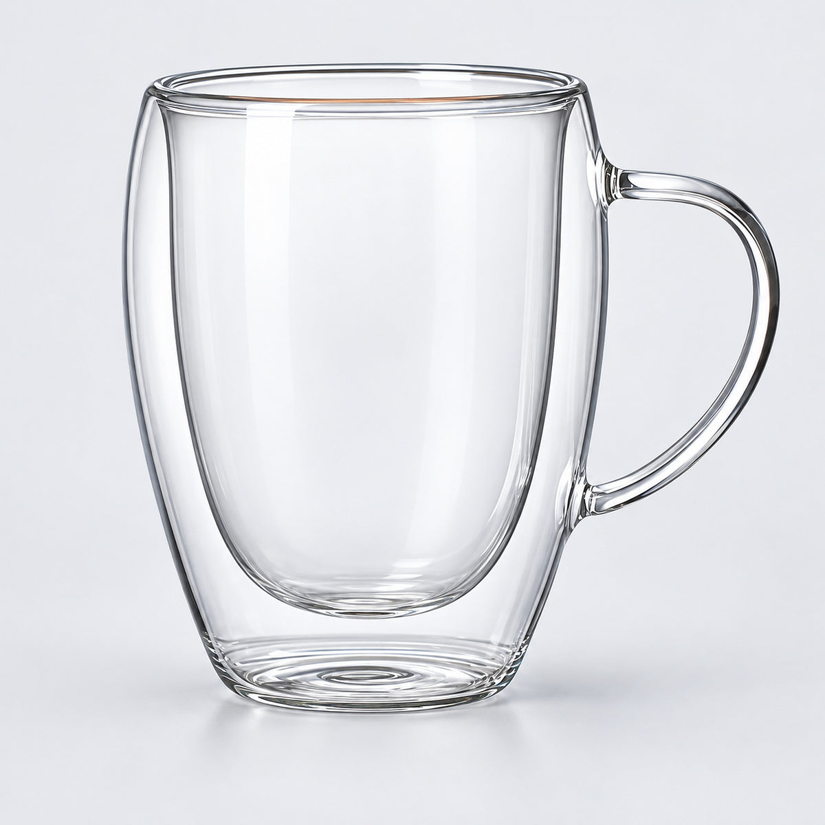 One empty 350 ml clear double-wall glass mug with handle.