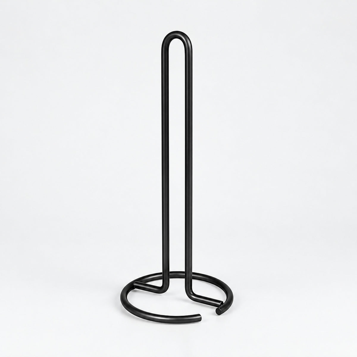 Empty black upright paper towel stand with open wire base.