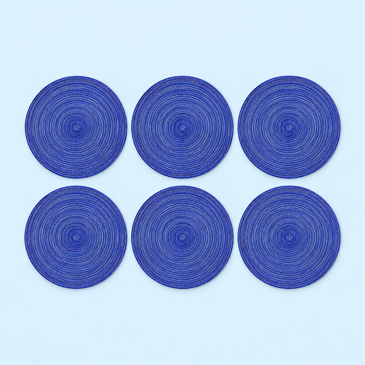 Six blue braided round mats.