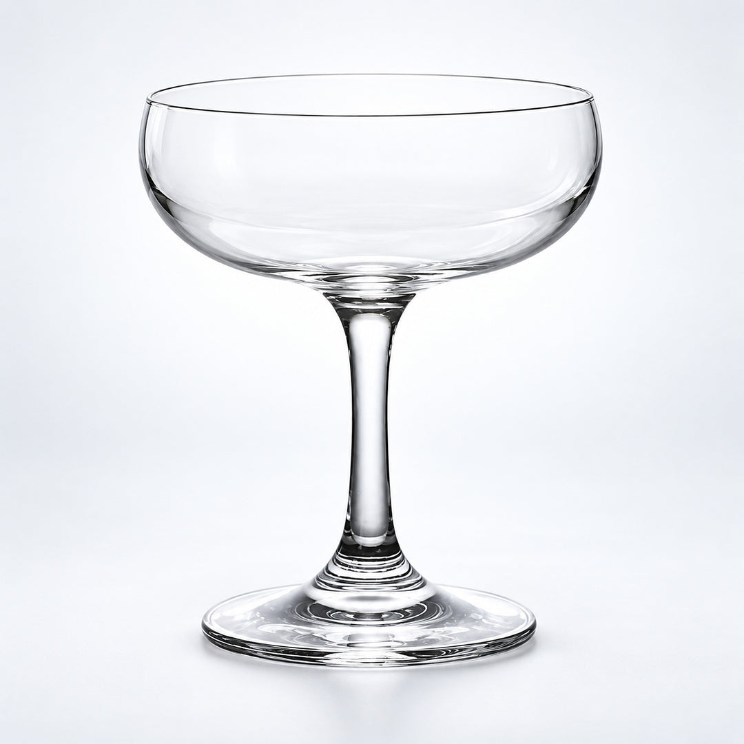 Empty 180 ml rounded coupe glass.