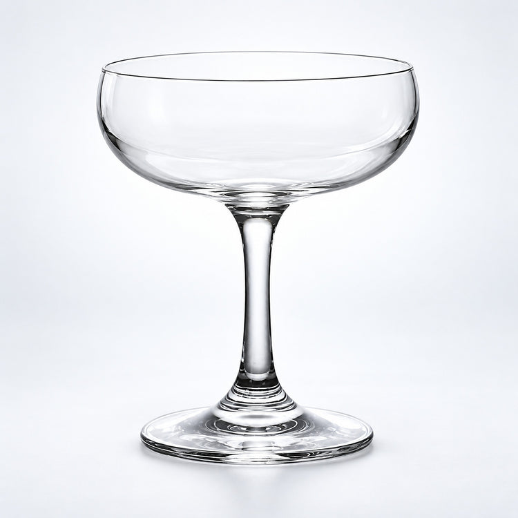 Empty 180 ml rounded coupe glass.