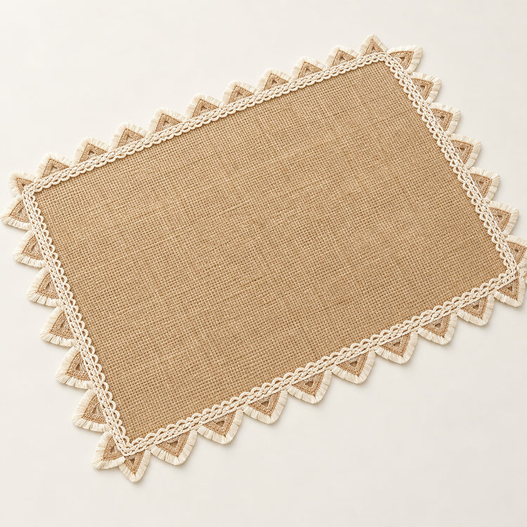 One tan placemat with cream triangle trim, 30 x 45 cm.