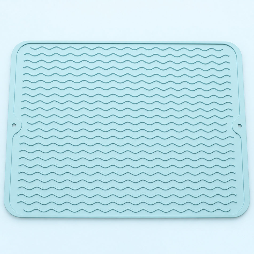 Light blue wavy-ridge silicone mat with two hanging holes.