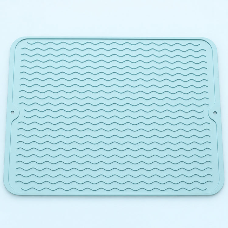 Light blue wavy-ridge silicone mat with two hanging holes.