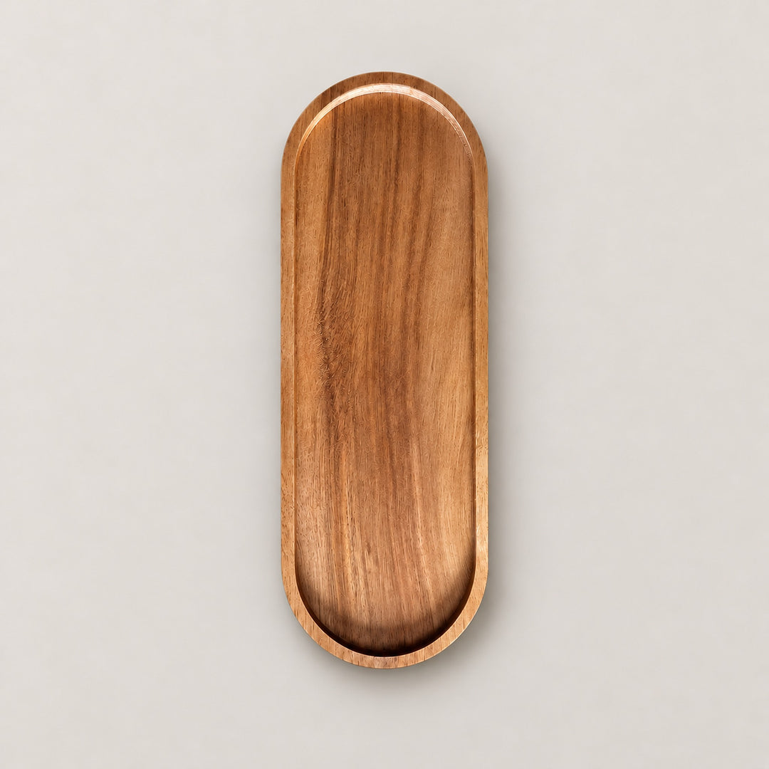One large, 29 x 10.5 cm oval wood tray on a pale studio background.