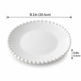 Round ceramic plate, 20.5 cm diameter and 2.4 cm high; one piece.