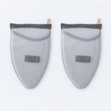 Two tapered garment-steaming pads with mesh hand pockets.