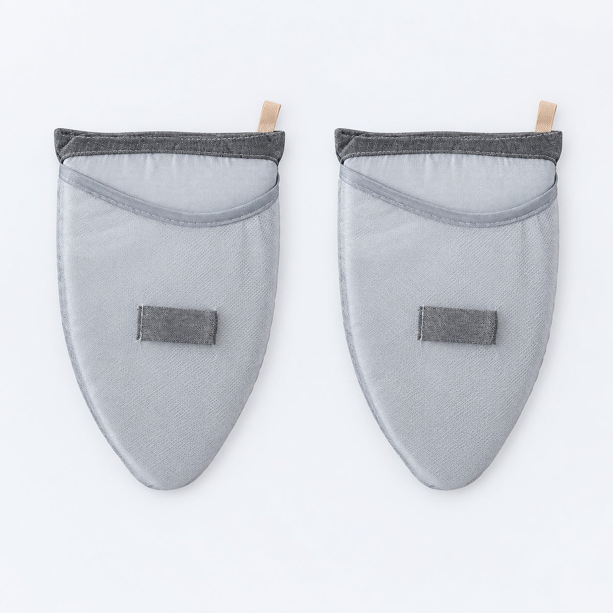 Two tapered garment-steaming pads with mesh hand pockets.