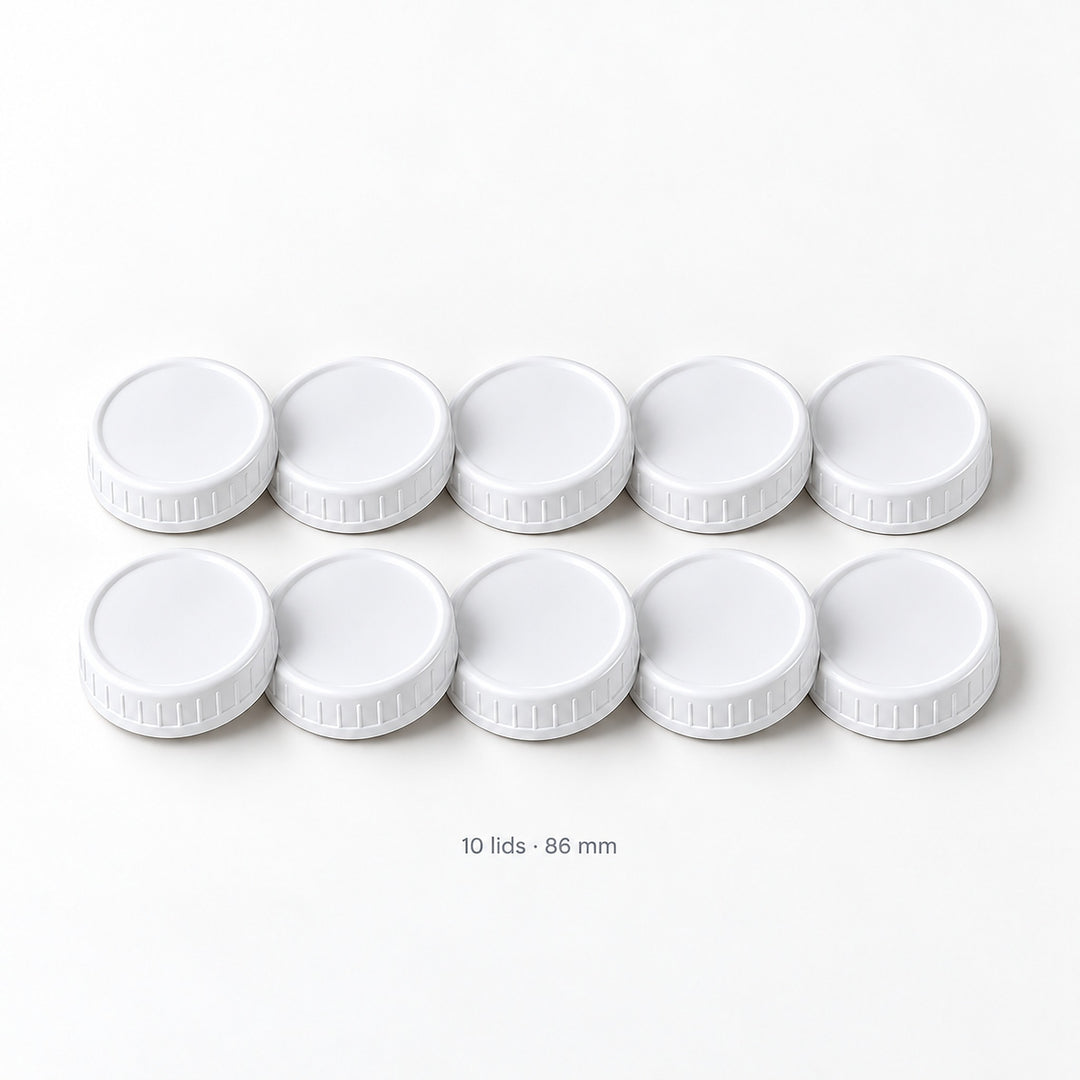 Set of ten white 86 mm ribbed plastic mason jar lids.