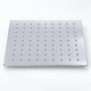 A square stainless steel rain shower head plate with multiple rows of small decorative finials, shown on a clean white background.