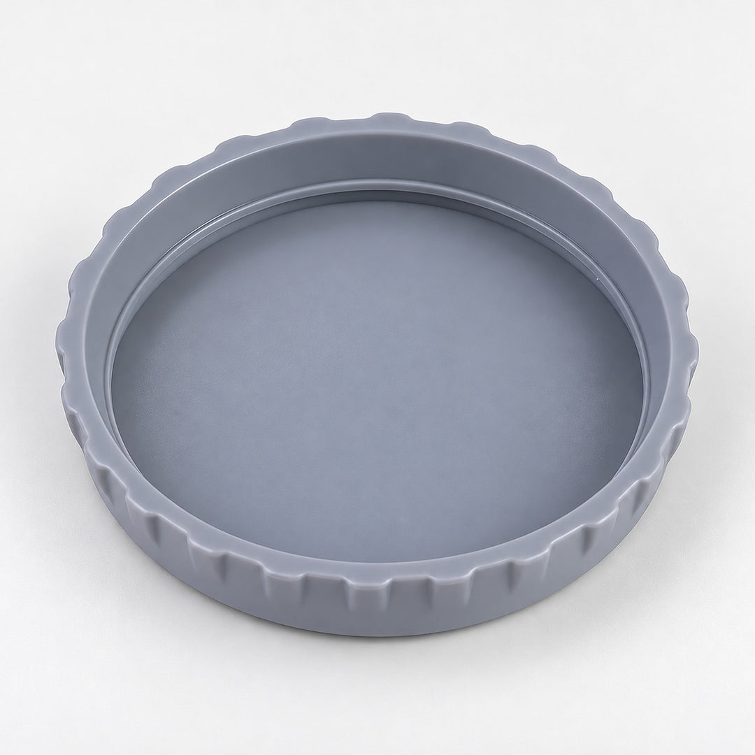 One gray lid, interior-up studio view on pale gray.