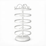Empty white five-tier jewelry stand with domed circular white pedestal.