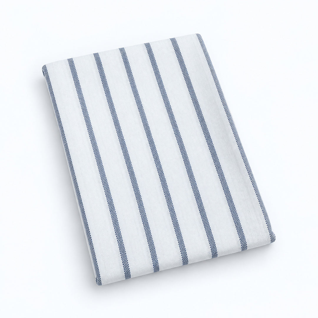 Single white stripes cotton towel, folded studio view.