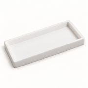 A minimalist white rectangular tray with a shallow, rounded rim, photographed on a seamless white background.