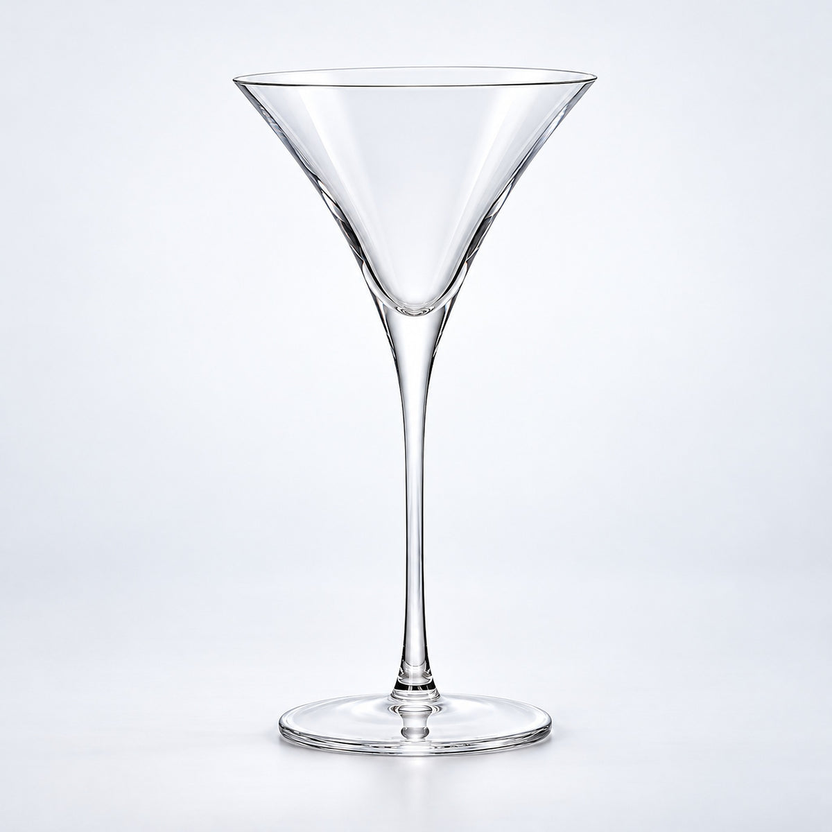 Empty 300 ml tall conical martini glass.