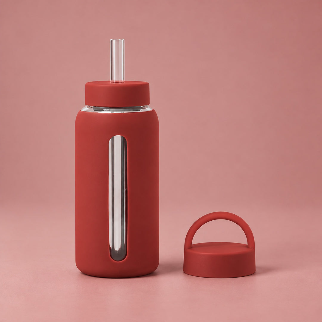 Brick Red 800 ml glass bottle with silicone sleeve, wide straw and spare loop lid.
