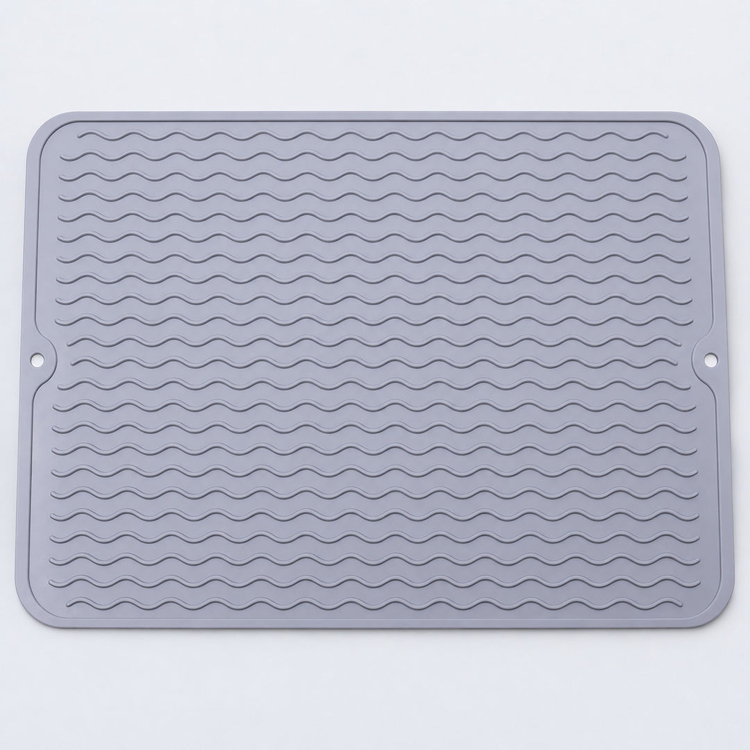 Light gray wavy-ridge silicone mat with two hanging holes.