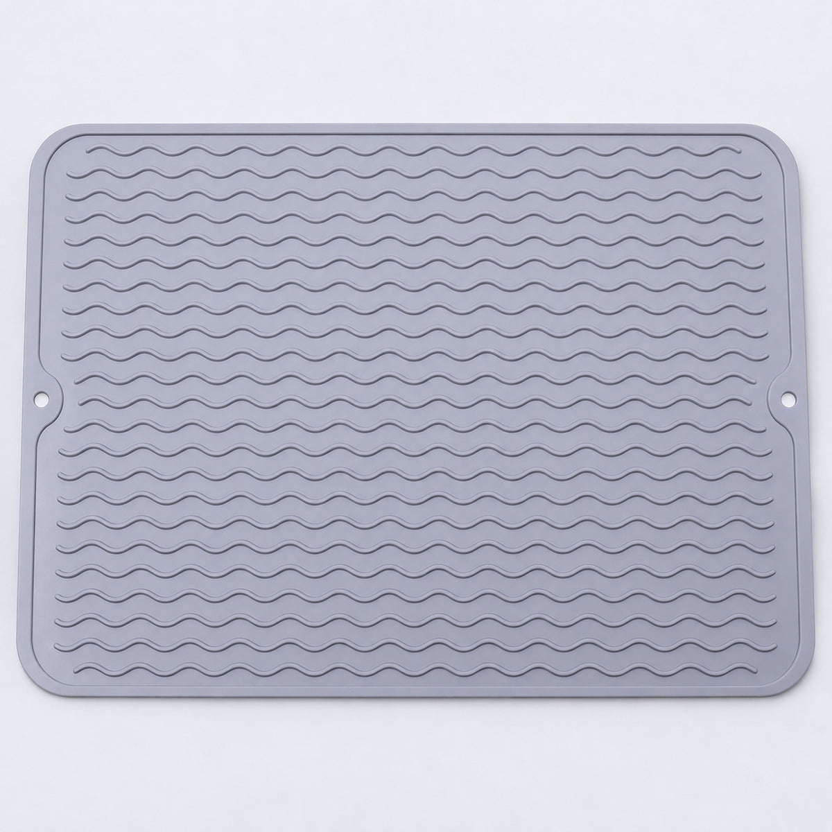 Light gray wavy-ridge silicone mat with two hanging holes.
